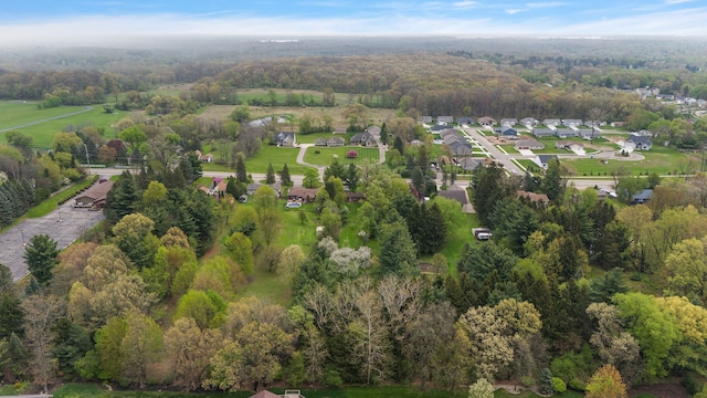 1090 S Williams Lake Rd, White Lake, MI 48386 - view of property location with a forest