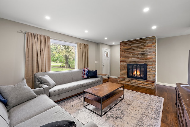 1090 S Williams Lake Rd, White Lake, MI 48386 - living area with recessed lighting, wood finished floors, a large fireplace, and baseboards