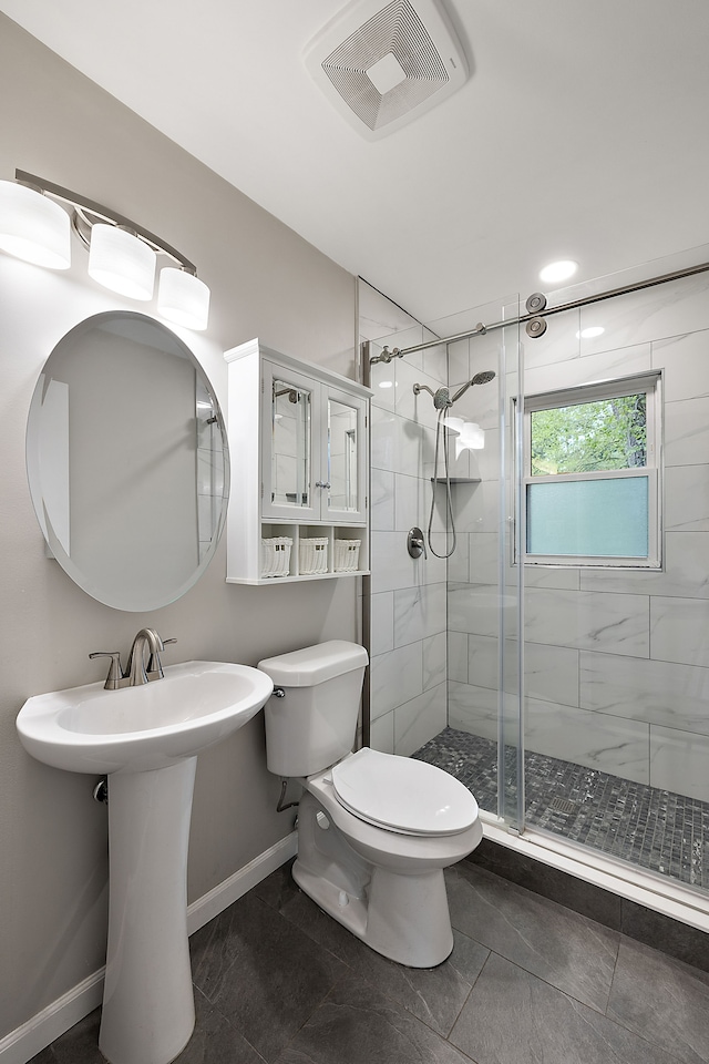 1090 S Williams Lake Rd, White Lake, MI 48386 - full bath with a stall shower, toilet, and baseboards