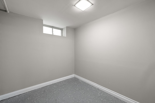 1090 S Williams Lake Rd, White Lake, MI 48386 - below grade area featuring baseboards