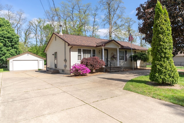 3142 Buss Dr, Commerce Twp, MI 48390 - ranch-style house featuring an outbuilding, a detached garage, a porch, and a shingled roof