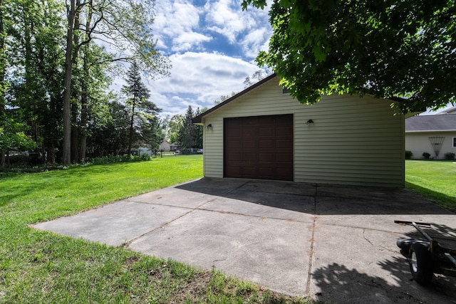 3142 Buss Dr, Commerce Twp, MI 48390 - detached garage featuring concrete driveway