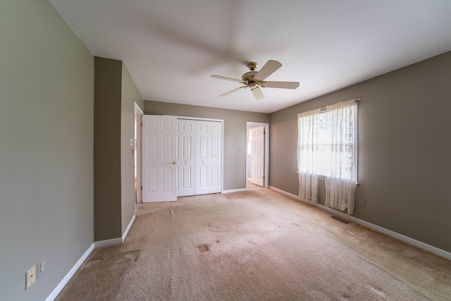 3142 Buss Dr, Commerce Twp, MI 48390 - unfurnished bedroom with carpet, baseboards, and a closet