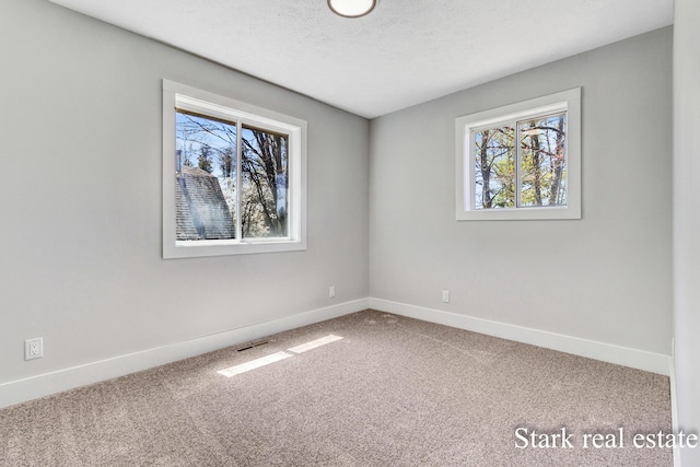 3339 N Weber Rd, Muskegon, MI 49445 - empty room with carpet flooring and baseboards