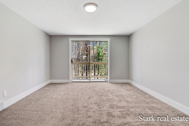 3339 N Weber Rd, Muskegon, MI 49445 - carpeted empty room featuring baseboards