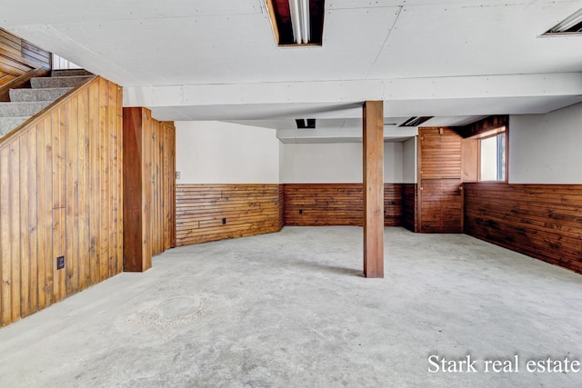 3339 N Weber Rd, Muskegon, MI 49445 - basement featuring wood walls and stairway