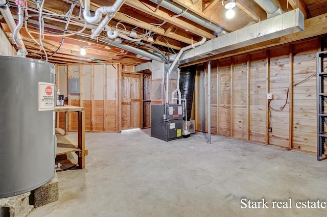 3339 N Weber Rd, Muskegon, MI 49445 - unfinished below grade area with electric water heater and heating unit