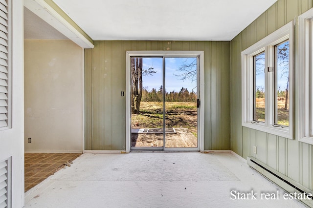 3339 N Weber Rd, Muskegon, MI 49445 - doorway featuring baseboard heating and baseboards