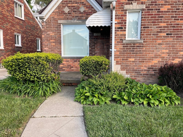 11520 Engleside St, Detroit, MI 48205 - view of exterior entry featuring brick siding