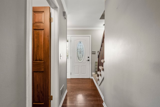 50631 Newcastle Dr, Chesterfield, MI 48047 - entryway with dark wood-style floors, stairway, crown molding, and baseboards