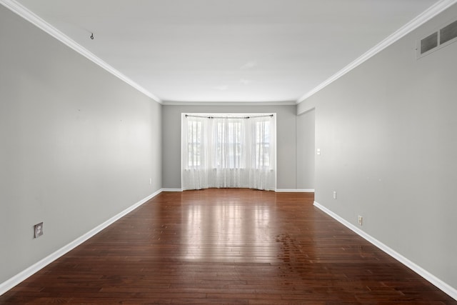 50631 Newcastle Dr, Chesterfield, MI 48047 - spare room featuring ornamental molding, wood-type flooring, and baseboards