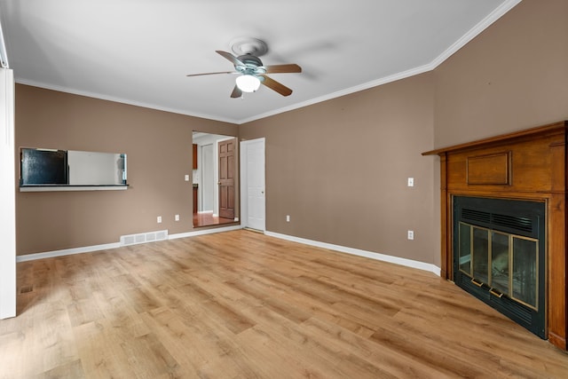 50631 Newcastle Dr, Chesterfield, MI 48047 - unfurnished living room with a ceiling fan, crown molding, light wood-type flooring, baseboards, and a glass covered fireplace