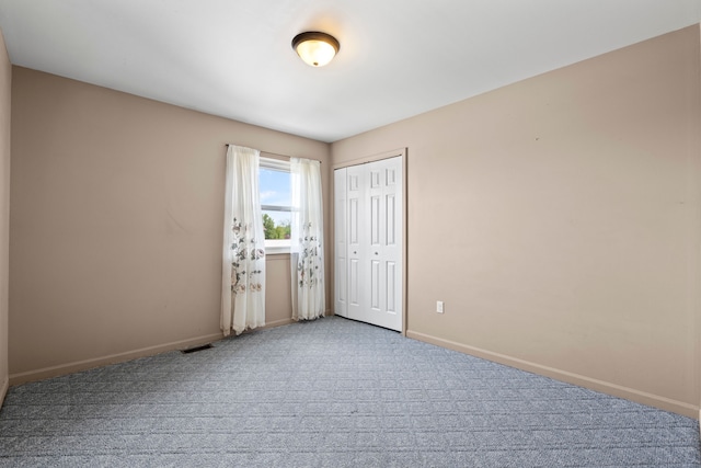 50631 Newcastle Dr, Chesterfield, MI 48047 - unfurnished bedroom featuring carpet floors, baseboards, and a closet