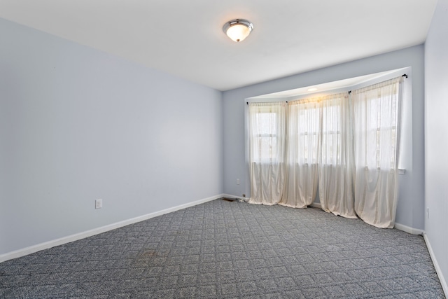 50631 Newcastle Dr, Chesterfield, MI 48047 - carpeted empty room featuring baseboards