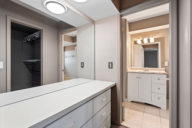 50631 Newcastle Dr, Chesterfield, MI 48047 - bathroom with vanity and tile patterned floors