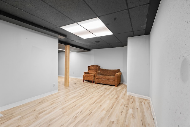 50631 Newcastle Dr, Chesterfield, MI 48047 - unfurnished room with a drop ceiling, wood finished floors, and baseboards