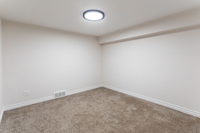 619 N Watkins, Perry, MI 48872 - spare room featuring carpet and baseboards