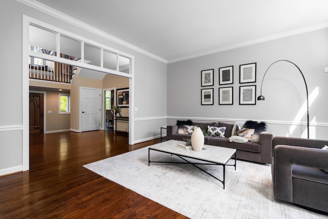 1303 Towsley Ln, Ann Arbor, MI 48105 - living area featuring crown molding, wood finished floors, and baseboards