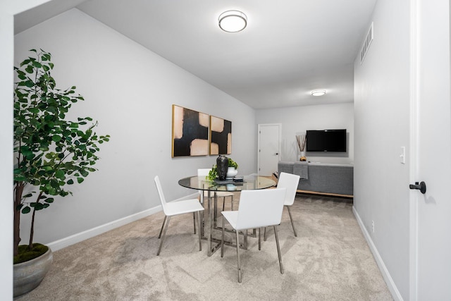 1303 Towsley Ln, Ann Arbor, MI 48105 - dining room with carpet floors and baseboards