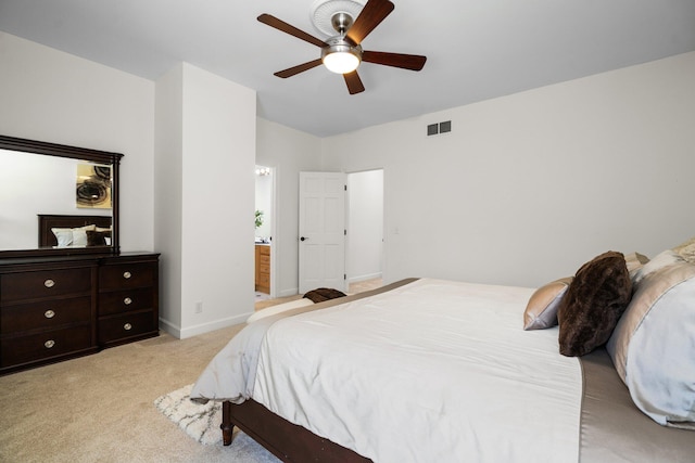 1303 Towsley Ln, Ann Arbor, MI 48105 - bedroom with light carpet, baseboards, a ceiling fan, and connected bathroom