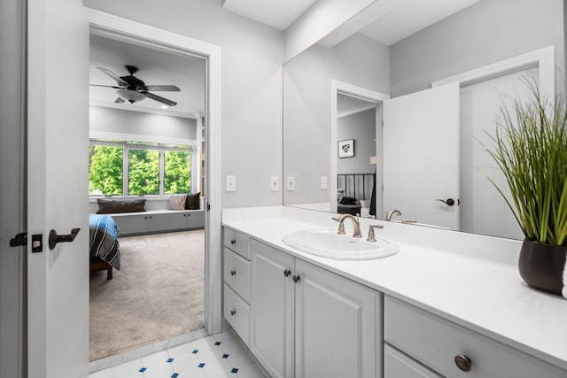 1303 Towsley Ln, Ann Arbor, MI 48105 - ensuite bathroom with vanity, a ceiling fan, and crown molding