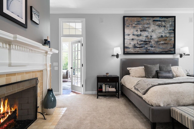 1303 Towsley Ln, Ann Arbor, MI 48105 - bedroom with a tile fireplace, carpet floors, ornamental molding, multiple windows, and baseboards