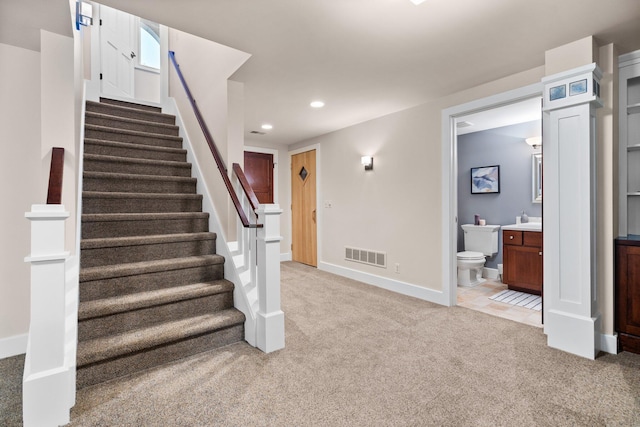 1303 Towsley Ln, Ann Arbor, MI 48105 - stairway featuring carpet floors, recessed lighting, and baseboards