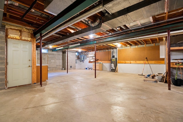 1303 Towsley Ln, Ann Arbor, MI 48105 - unfinished basement with water heater and concrete block wall
