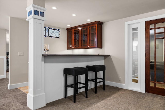 1303 Towsley Ln, Ann Arbor, MI 48105 - indoor dry bar with carpet flooring, recessed lighting, decorative columns, and baseboards