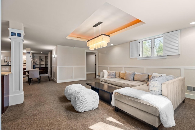 1303 Towsley Ln, Ann Arbor, MI 48105 - living area featuring carpet floors, a tray ceiling, a chandelier, and recessed lighting