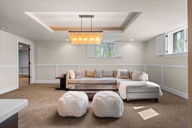 1303 Towsley Ln, Ann Arbor, MI 48105 - living area with a tray ceiling, carpet floors, a chandelier, and recessed lighting