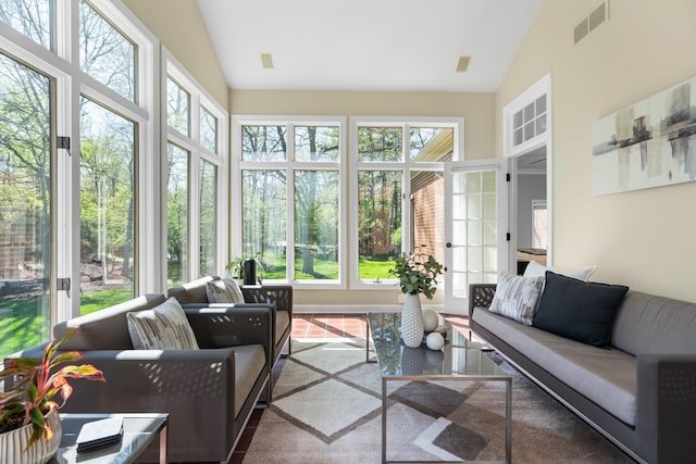 1303 Towsley Ln, Ann Arbor, MI 48105 - sunroom / solarium featuring french doors, outdoor lounge area, and lofted ceiling