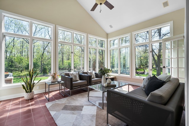 1303 Towsley Ln, Ann Arbor, MI 48105 - sunroom with high vaulted ceiling, tile patterned floors, and baseboards