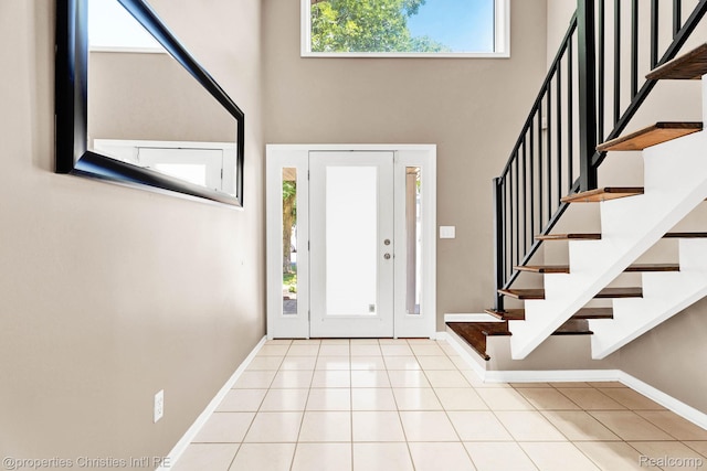 1700 Maddy Ln, Keego Harbor, MI 48320 - tiled foyer featuring a towering ceiling and stairs