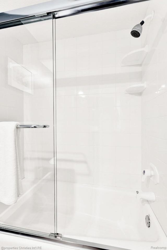 1700 Maddy Ln, Keego Harbor, MI 48320 - bathroom with shower / bath combination with glass door