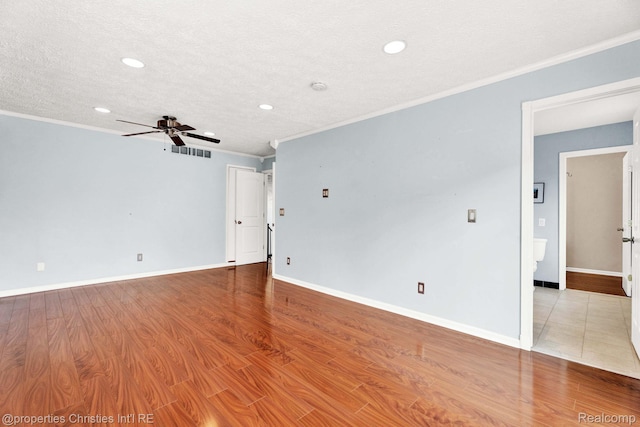 1700 Maddy Ln, Keego Harbor, MI 48320 - unfurnished room featuring recessed lighting, crown molding, ceiling fan, wood finished floors, and a textured ceiling