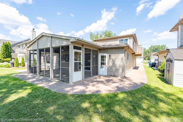 1700 Maddy Ln, Keego Harbor, MI 48320 - rear view of house with a sunroom, a lawn, a patio, and a chimney