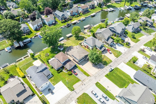1700 Maddy Ln, Keego Harbor, MI 48320 - aerial perspective of suburban area featuring a large body of water