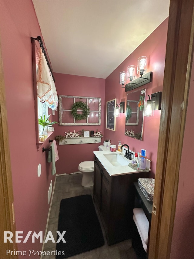 1321 Rollins St, Grand Blanc, MI 48439 - bathroom with toilet and vanity