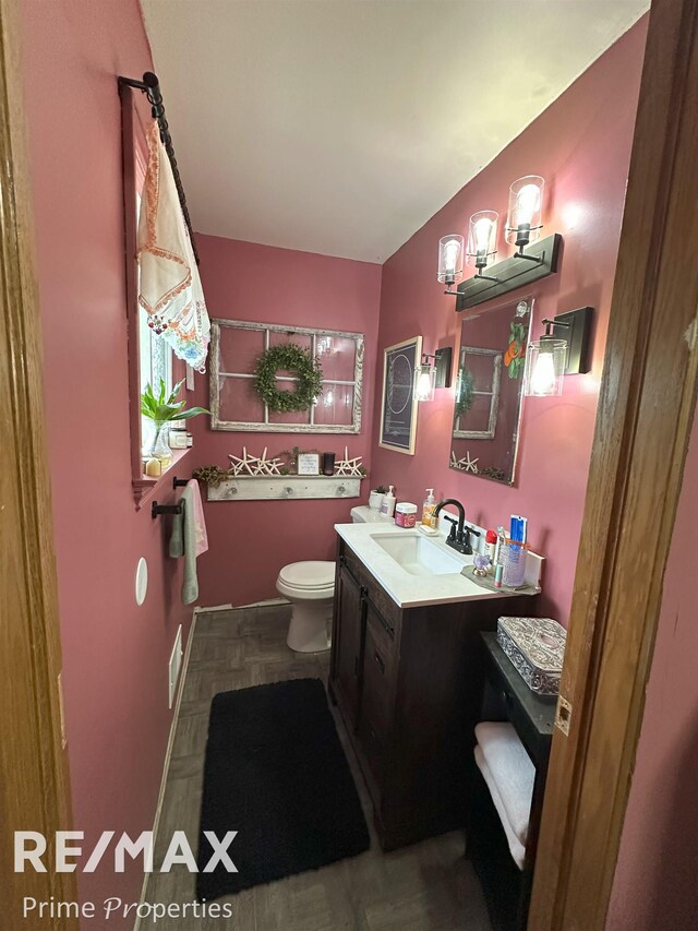 1321 Rollins St, Grand Blanc, MI 48439 - bathroom with toilet and vanity