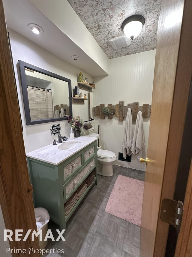 1321 Rollins St, Grand Blanc, MI 48439 - bathroom featuring toilet and vanity