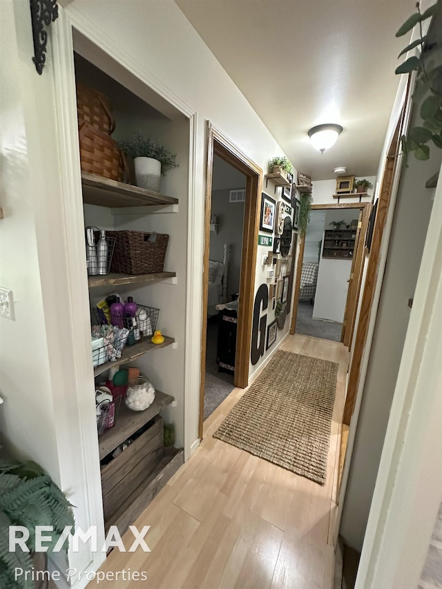 1321 Rollins St, Grand Blanc, MI 48439 - corridor featuring wood finished floors