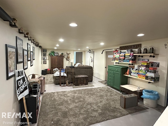 1321 Rollins St, Grand Blanc, MI 48439 - living area featuring recessed lighting and finished concrete flooring
