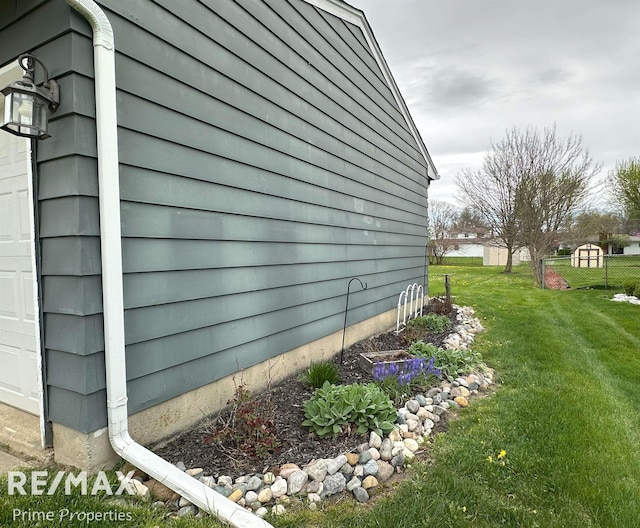 1321 Rollins St, Grand Blanc, MI 48439 - view of side of home with a yard