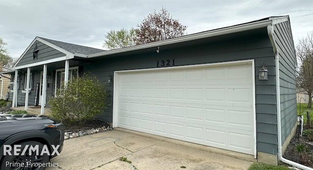 1321 Rollins St, Grand Blanc, MI 48439 - view of front of property with driveway and a garage
