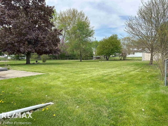1321 Rollins St, Grand Blanc, MI 48439 - view of yard featuring a patio