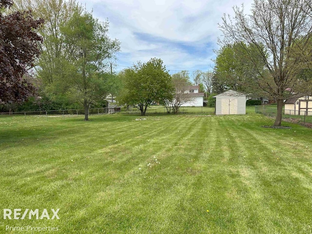 1321 Rollins St, Grand Blanc, MI 48439 - view of yard featuring a shed and an outdoor structure