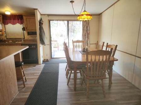 4297 N Wilderness Trl, Luther, MI 49656 - dining area with wood finished floors