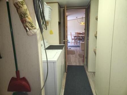 4297 N Wilderness Trl, Luther, MI 49656 - laundry room featuring independent washer and dryer