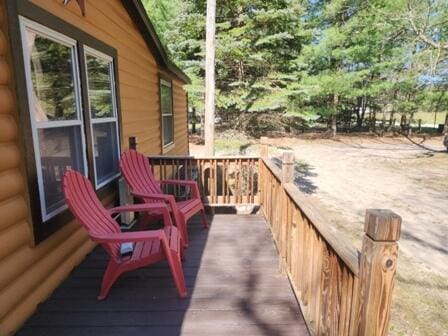 4297 N Wilderness Trl, Luther, MI 49656 - view of wooden deck